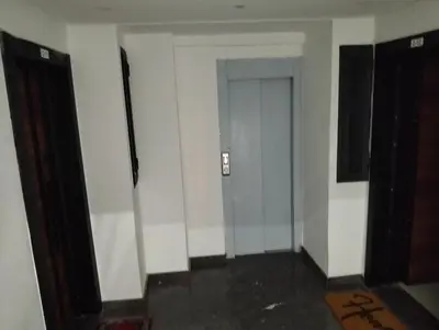 an empty room with a hallway with a door at Apartment Sea view Toudert Anza Agadir in Oulad Akkou