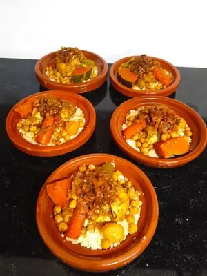 a group of four bowls of food on a table at Villa Roseaux heated pool Marrakech in Najem