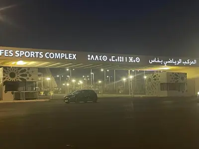a car parked in front of a gas station at night at Joude in Fès