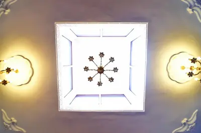 a picture of a window with a snowflake on a wall at DAR El Ghali in Fès