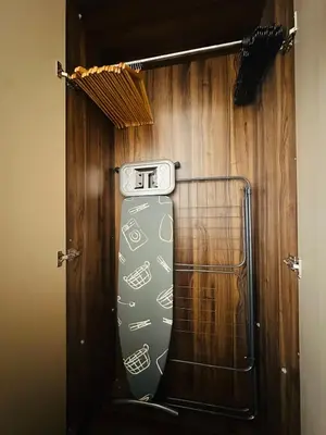 a door with a sign on top of a skateboard at 1 Bedroom Apartment Rooftop Pool Marrakech in Oulad Akkou