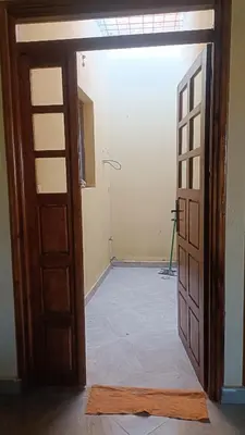 an open door into an empty room with a room at Casa caram in Hassilabied