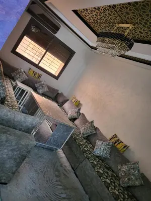 an overhead view of a living room with a couch at Appartement de luxe in Meknès