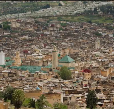 an aerial view of a city with buildings at Good life in Fès