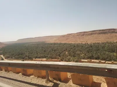 a view from the side of a road with a mountain at chez zakaria luxury tent camp merzouga in Merzouga