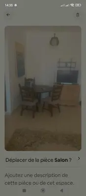 a living room with two chairs and a table at Kamelia Ifrane in Ifrane