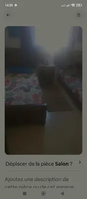 a screenshot of a bedroom with a bed with a comforter at Kamelia Ifrane in Ifrane
