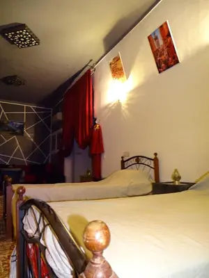 a bedroom with two beds in a room at Youth housing EL HABIB in Fès