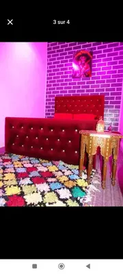 a living room with a couch and a table at Youth housing EL HABIB in Fès