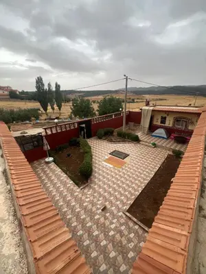 a view of a patio from the roof of a house at Gite taymate in Zaouia Ben Smine