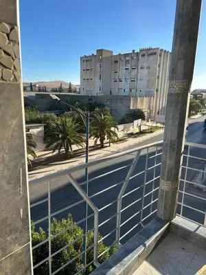 a view of a street from a building at Bel appartement en plein Taza in Taza