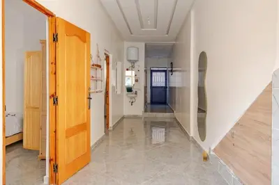 a room with a hallway with a mirror on the wall at Maison authentique Ourika avec vue sur l'Atlas in Ourika