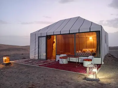 a dome house in the middle of the desert at Luxury Queen Camp in Tisserdmine