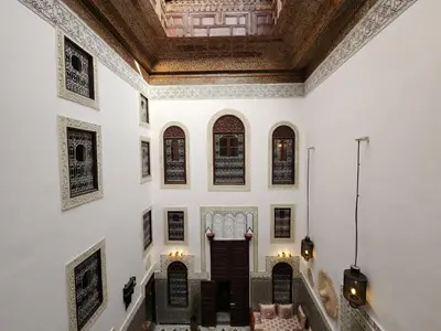a hallway of a building with a ceiling at Riad Dar Mazaj Fes in Fès