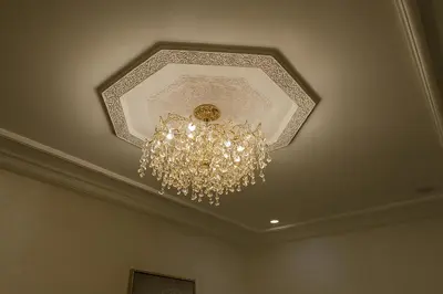 a ceiling with a chandelier in a room at Nakal in Fès
