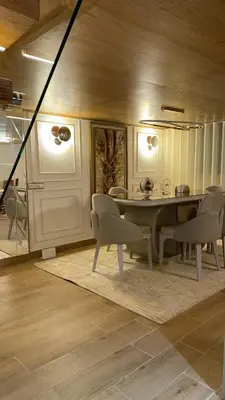 a dining room with a table and chairs at Illy house in Ifrane