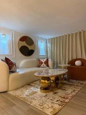 a living room with a couch and a table at Illy house in Ifrane