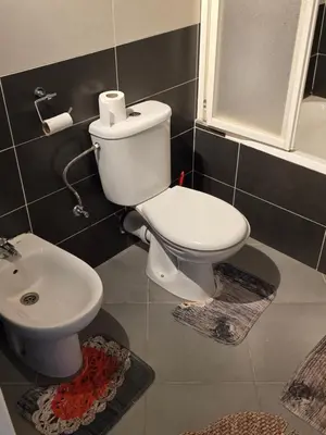 a bathroom with a toilet and a sink at andalus in Fès