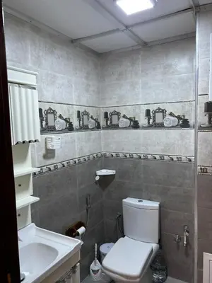 a bathroom with a toilet and a sink at Absolute Calm & Panoramic Views in Oulad Akkou