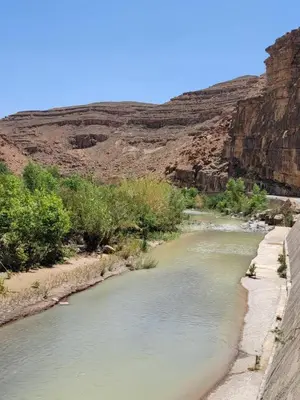 a river in the middle of a canyon at Auberge baddou amougar in Amouguer