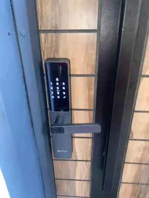 a cell phone sticking out of a door at شقة فخمة in Ifrane