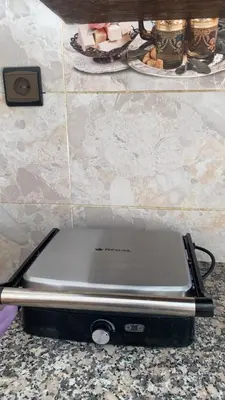 a laptop computer sitting on top of a counter at شقة فخمة وهادئة in Ifrane
