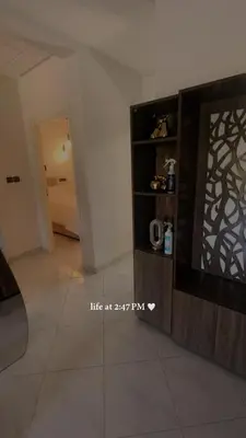 a living room with a door and a hallway at شقة فخمة وهادئة in Ifrane