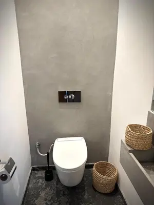a bathroom with a white toilet and a sink at Rooftop avec Piscine privée - 2 chambres - Marrakech in Oulad Akkou