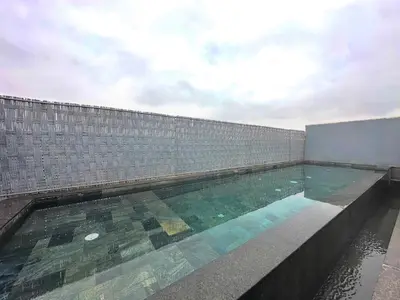 a swimming pool on top of a building at Rooftop avec Piscine privée - 2 chambres - Marrakech in Oulad Akkou