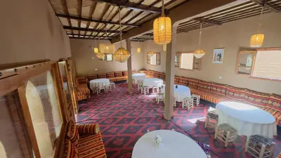 an overhead view of a restaurant with tables and chairs at Nana Diafa - Zagora Guest House & Restaurant in Zagora