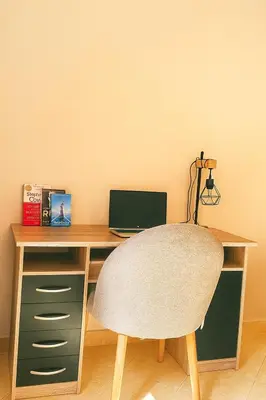 a desk with a chair and a laptop on it at Marrakech Villa Floor Private Garden & Sport Space in Oulad Akkou
