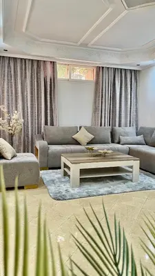 a living room with a couch and a coffee table at Marrakech Villa Floor Private Garden & Sport Space in Oulad Akkou