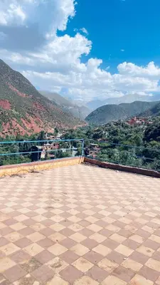 a view from the top of a building with mountains at Chez Mazgiti in Ourika