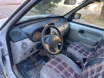 a car with the inside of the car with the dashboard at Home twins in Fès
