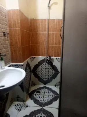 a bathroom with a shower and a sink at KASBAH Guests Travel in Fès