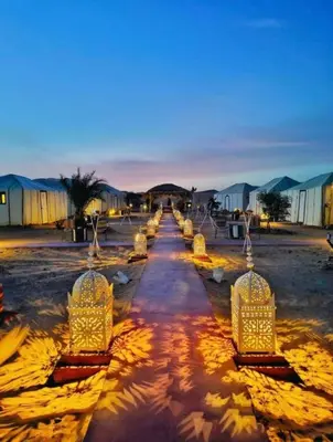 a row of lights lined up in a parking lot at Merzouga Toop Luxury Camp in Merzouga