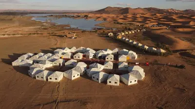 an aerial view of a village in the desert at Bivouac Luxe Masandoia Meteorites in Lac Yasmins