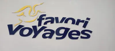 a sign for the trump venezuelas logo at FAVori in Oulad Akkou
