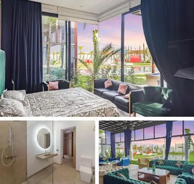 a room with a bed and a large window at Villa solea in Marrakech