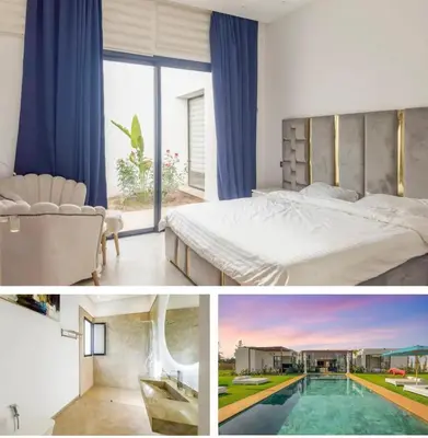 a bedroom with a large bed and a swimming pool at Villa solea in Marrakech