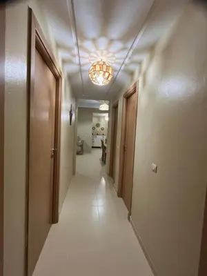 a corridor of a hallway with a ceiling at Grand appartement de 3 chambres Idéal familles et groupes Résidence sécurisée in Marrakech