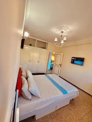 a bedroom with a bed in a room at Appartement luxe 2 Chambres 5 min du Centre Ville in Fès