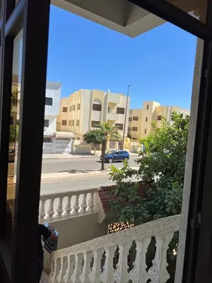 a view of a street from a balcony at Appartement luxe 2 Chambres 5 min du Centre Ville in Fès