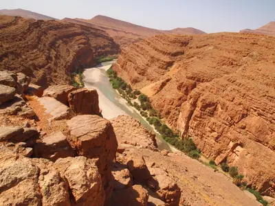 a view of a canyon with a road in the desert at Kasbah Dounia in Kerrando