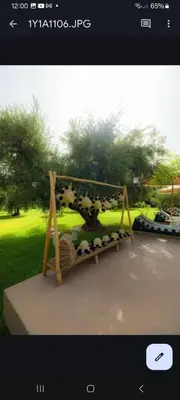 a picture of a wooden frame with animals on it at Villa Stevana in Oulad Mazoug