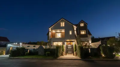 a house at night with its lights on at Villa Lumiere-Luxury Retreat with Private Spa and Garden in Ifrane