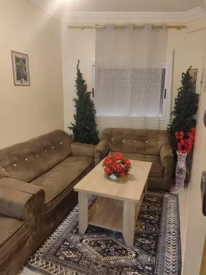 a living room with a couch and a coffee table at Relaxnstay midelt in Midelt