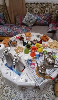 a white table with food on top of it at Maison Soulaîmi in Fès