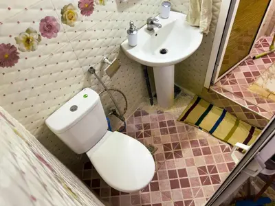 a bathroom with a toilet and a sink at vintage in Fès