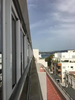 a view from the balcony of a building at appartement tanger in Oulad Akkou